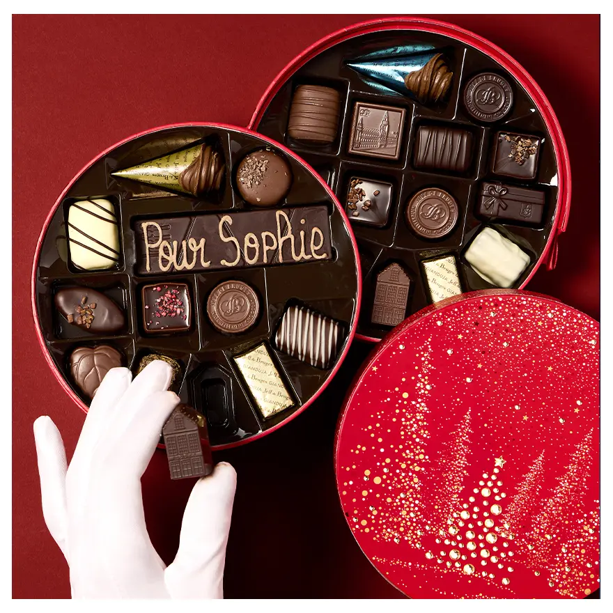 Boite de Noël ronde rouge ou bleue - 25 chocolats assortis et sa barre gourmande – Image 2